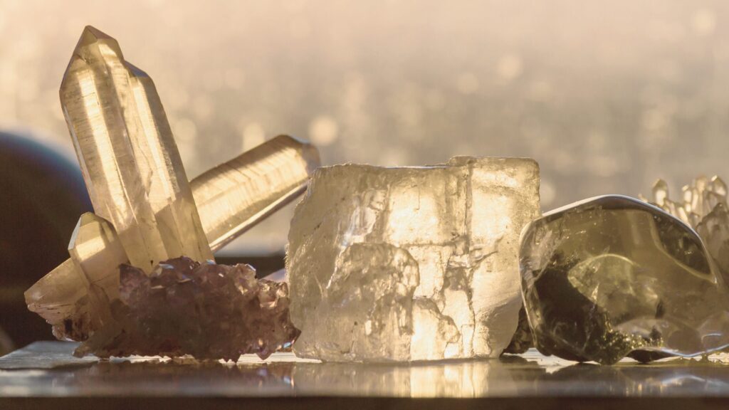 Human Design Projectors Society Gatherings with an image of light tan colored crystals in the background